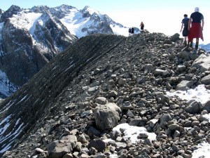 Walking a broken rock ridge above Barker Hut